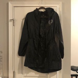 United by blue raincoat